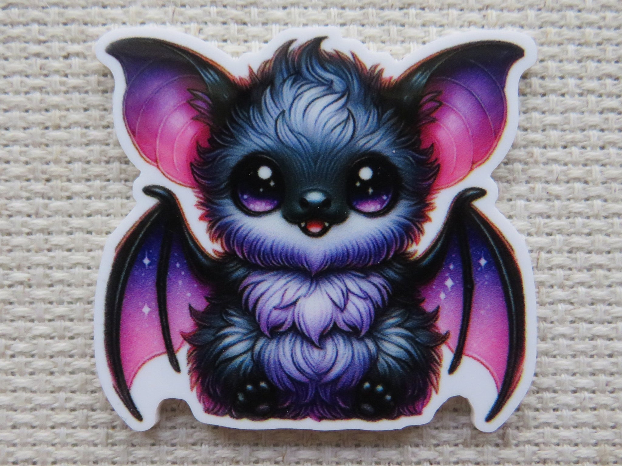 First view of Black and Purple Bat Needle Minder.