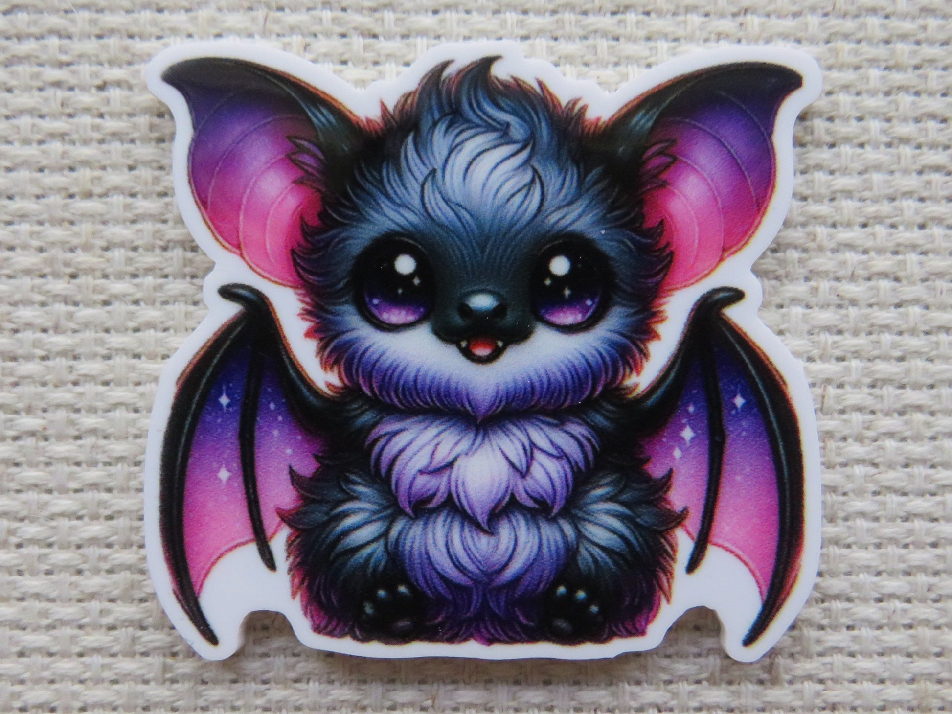 First view of Black and Purple Bat Needle Minder.