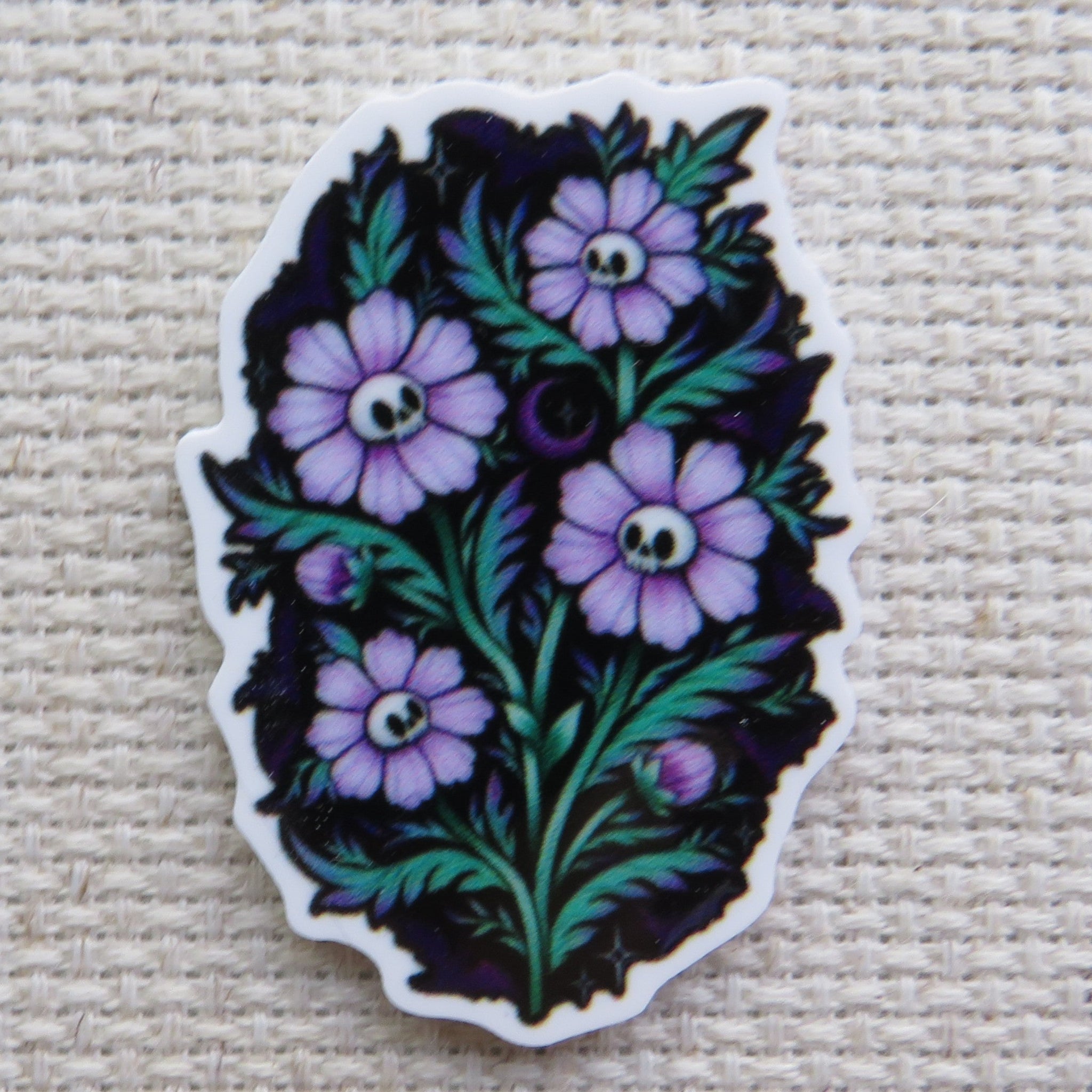 First view of Spooky purple flowers with skulls as their center minder.