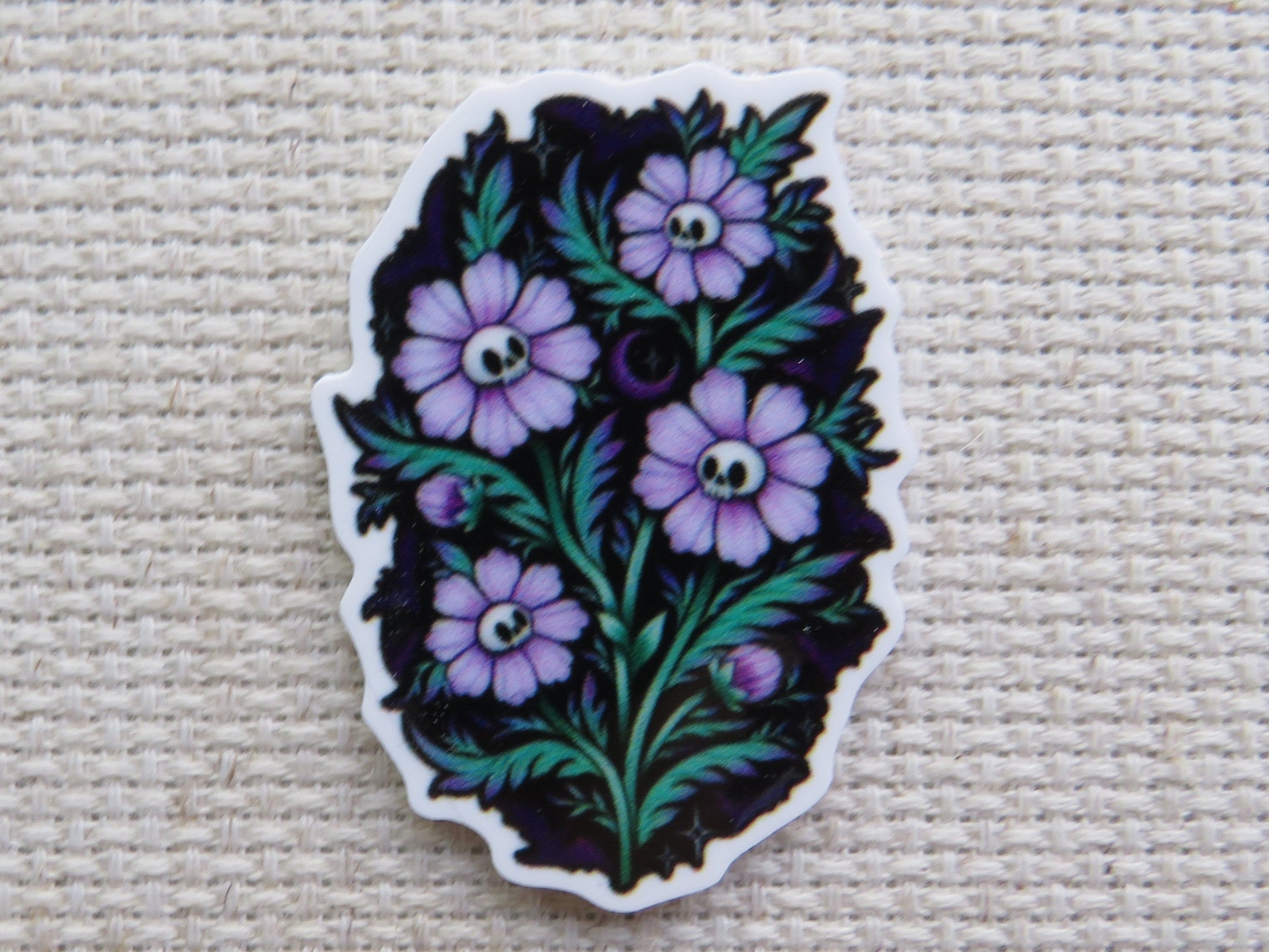 First view of Spooky purple flowers with skulls as their center minder.