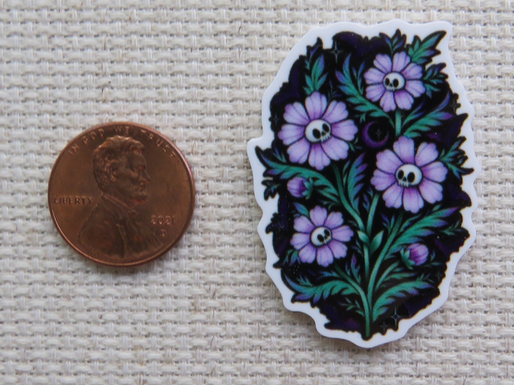 Second view of Spooky purple flowers with skulls as their center.
