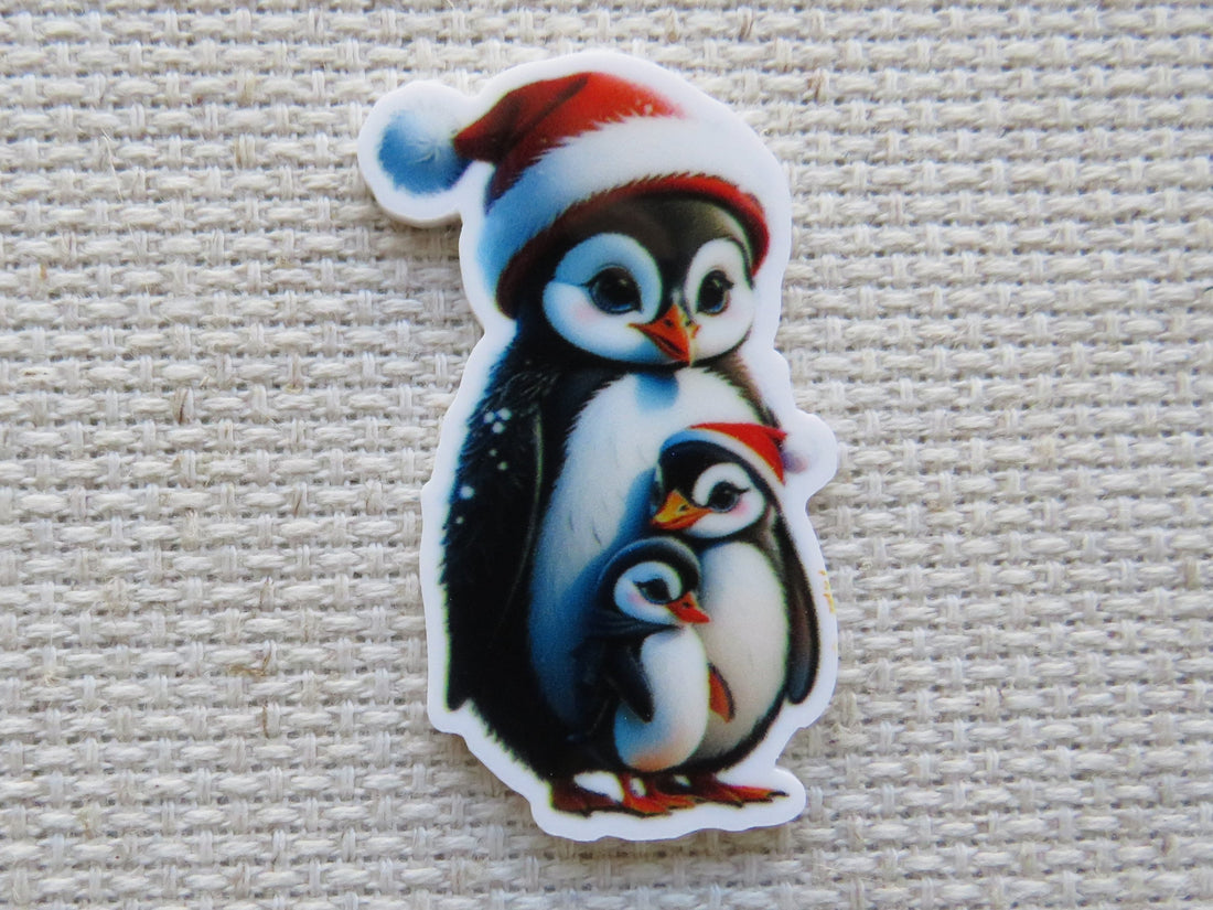 First view of Christmas Penguin Family Needle Minder.