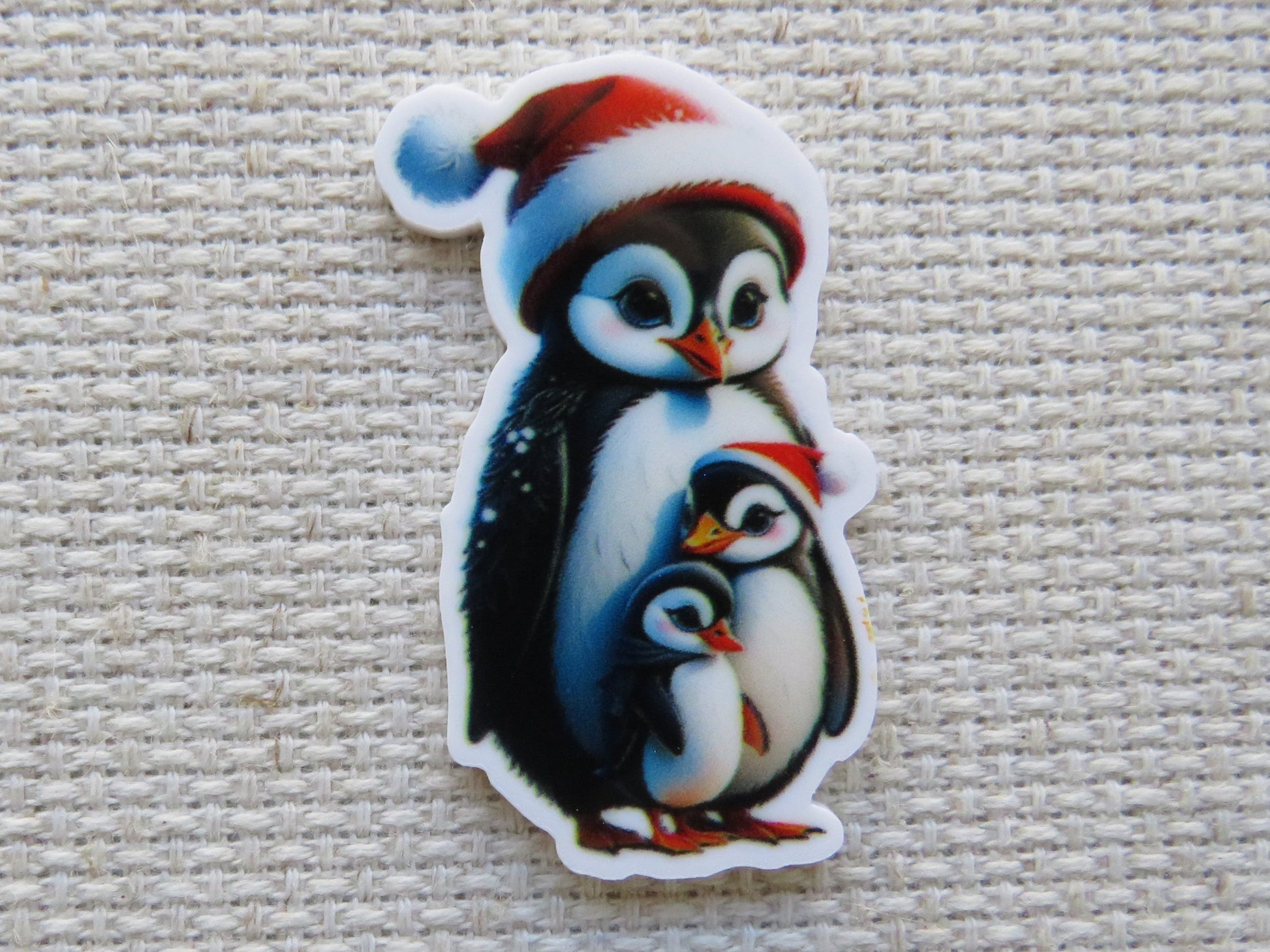 First view of Christmas Penguin Family Needle Minder.