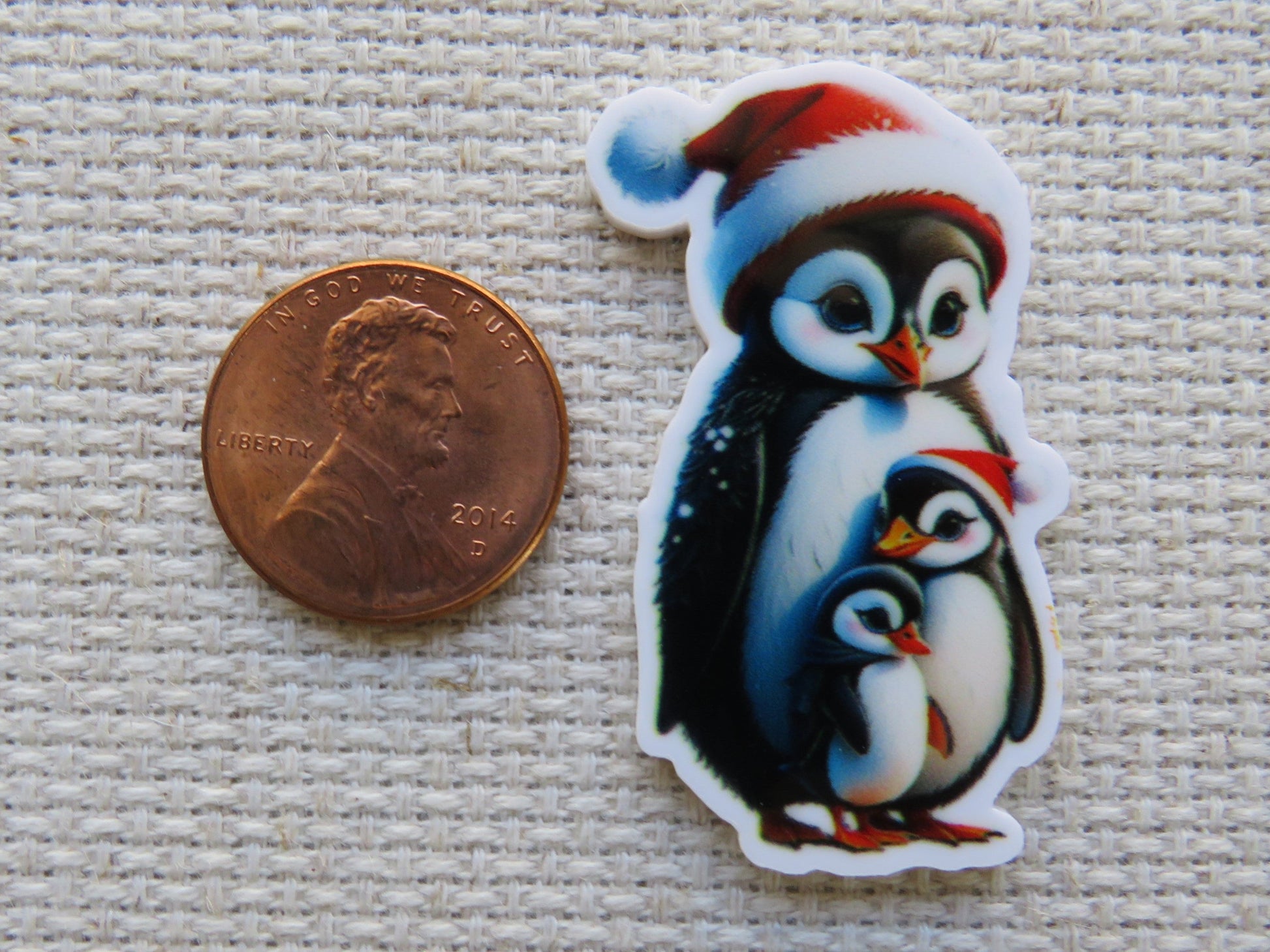 Second view of Christmas Penguin Family Needle Minder.