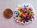 Second view of view of A Burst of Fall Colors Needle Minder, multicolored fall leaves in a bunch.