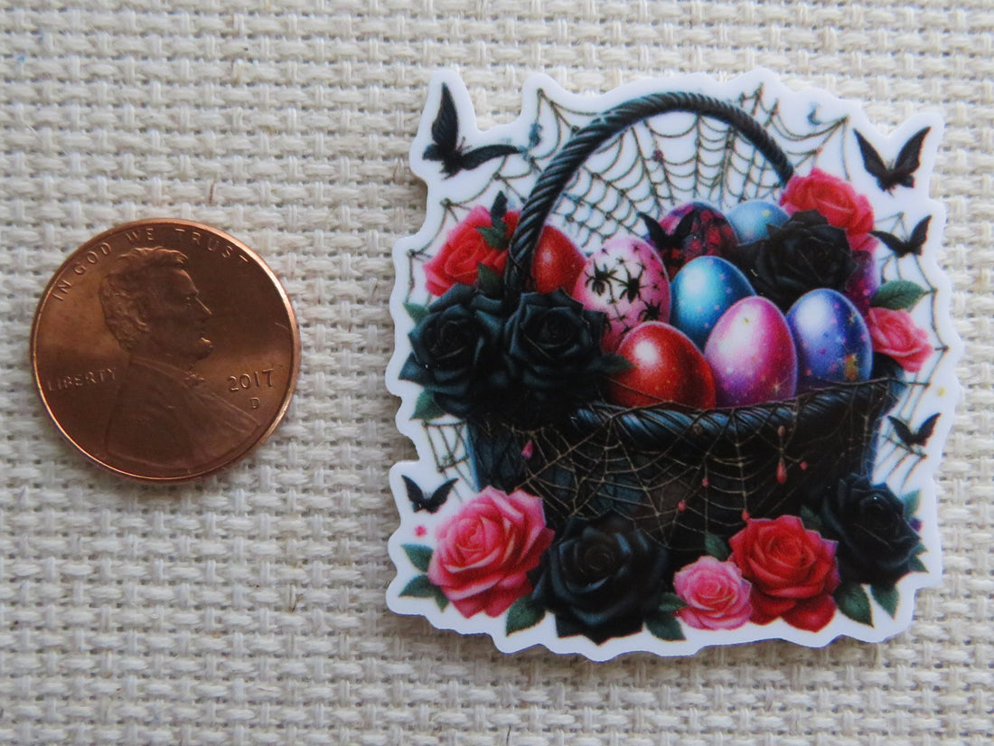 First view of a black Easter basket covered in spider webs with black butterflies and black and red roses.