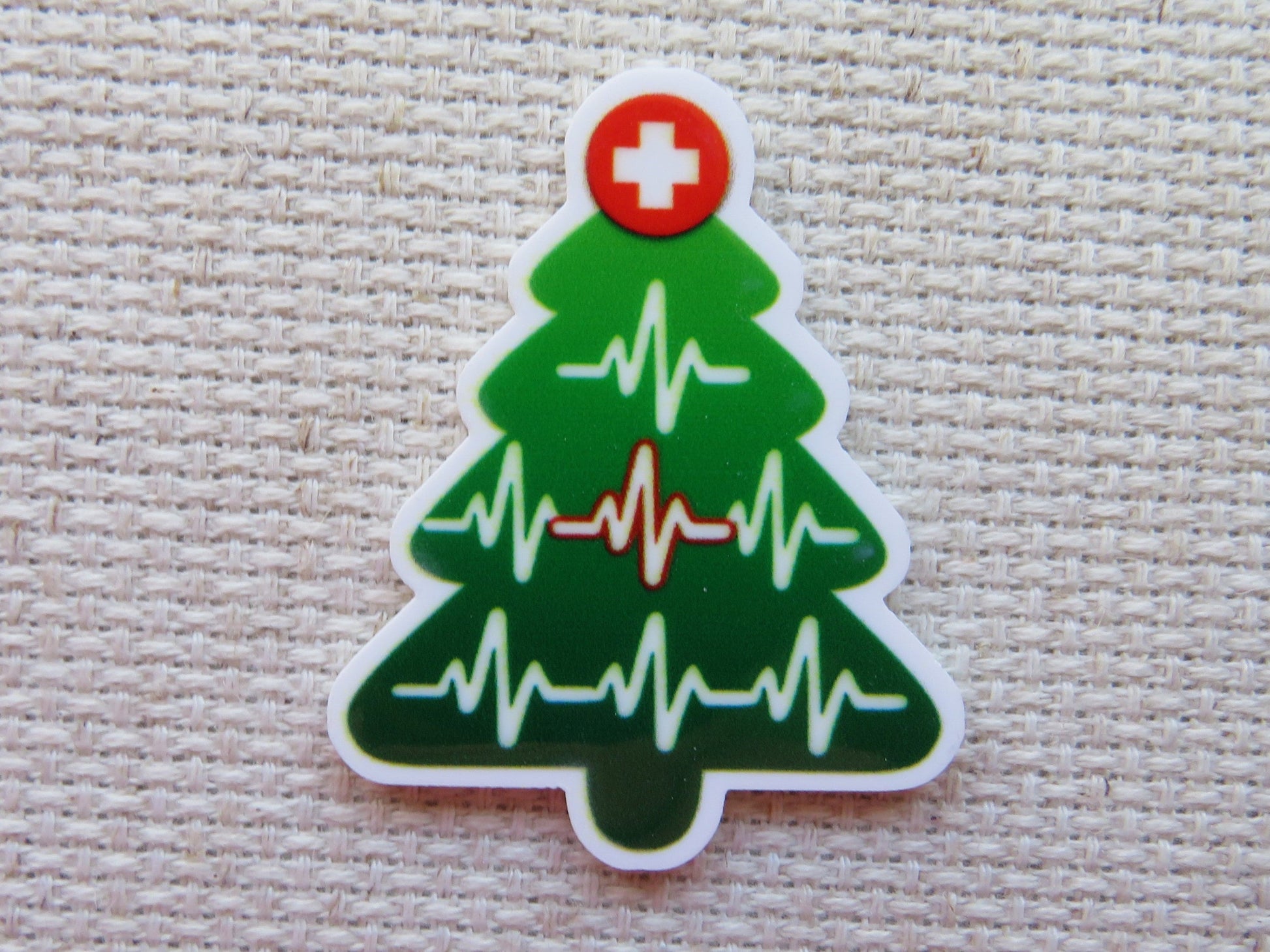 First view of Heartbeat Christmas Tree Needle Minder.