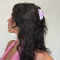 model wearing Sweetheart Clip in Daisy Pink Picnic in hair