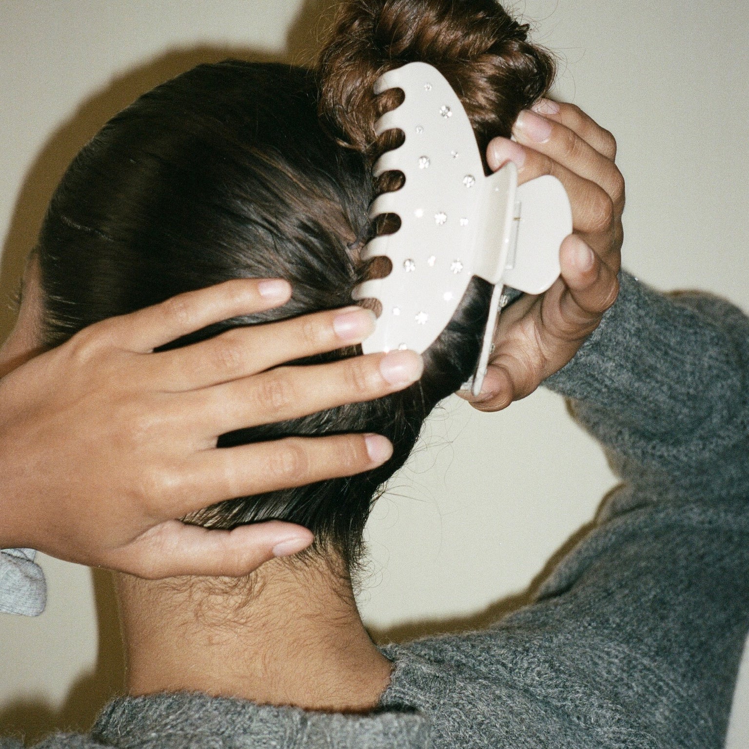 model wearing Big Effing Clip in Sugar Cookie in hair