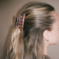 Closeup view of model wearing Sweetheart Clip in Cozy Cabin in hair.